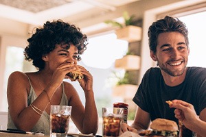 Friends enjoying meal together at restaurant