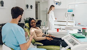 Patient and dentist talking about treatment plan