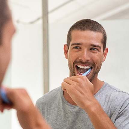 Patient in Catonsville brushing teeth