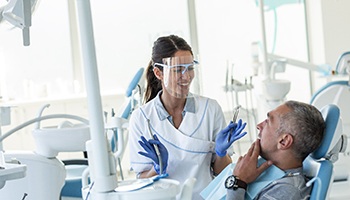 Dentist explaining treatment to patient