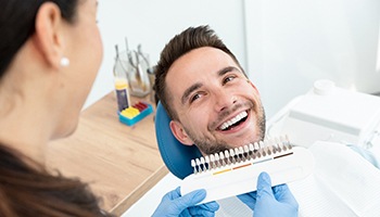 A man smiling after professional teeth whitening