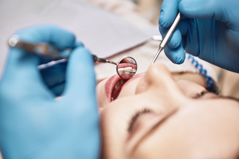 A woman receiving a dental checkup